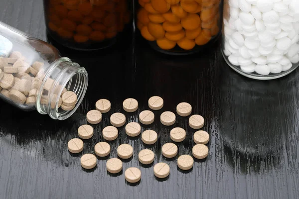 Medical Pills Glass Bottle Black Wooden Table — Fotografia de Stock