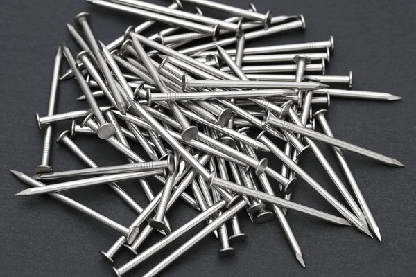 Pile Silver Metallic Nails Black Background — Stock Photo, Image