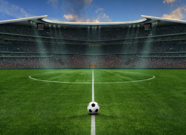 Futbol stadyumundaki yeşil alan. Orta sahada oyuna hazır.