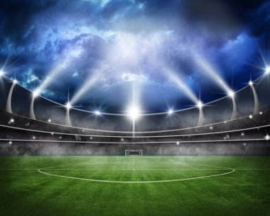 Futbol stadyumundaki yeşil alan. Orta sahada oyuna hazır.