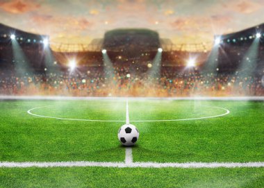 Güneşli bir günde desenli futbol maçı - top ortada, orta sahada