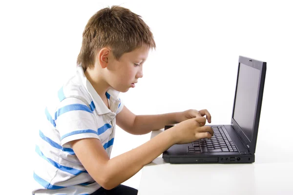 Child working on laptop — Stock Photo, Image