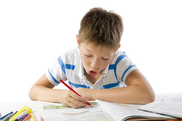 Niño haciendo la tarea —  Fotos de Stock