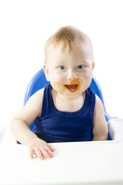 Ler blåögda barn utfodring pumpa puré — Stockfoto