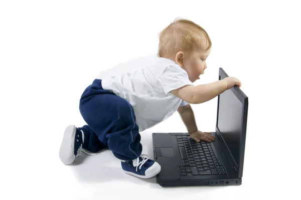 Baby and laptop — Stock Photo, Image