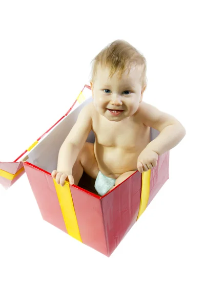 Smiling Blue eyed baby in present box — Stock Photo, Image