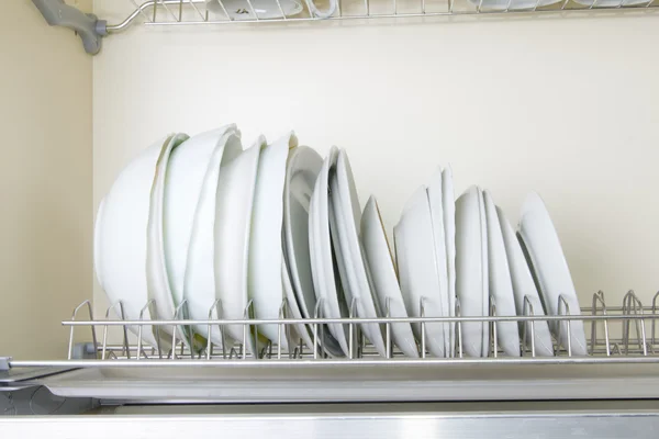 Dishes in the cupboard — Stock Photo, Image