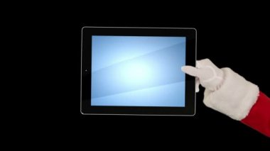 Noel Baba bir tablet sunulması sonra bir öpücük göndermek ve siyah karşı güle güle demek