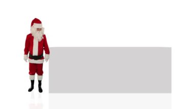 Noel Baba'ya karşı beyaz bir beyaz tahta işaret