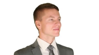 işadamı odak, döner ve karşı beyaz bir gülümseme elde