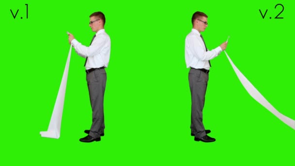 Young businessman reading a long bill, Green Screen — Stock Video