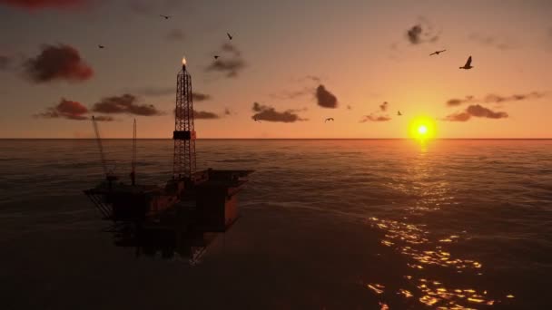 plate-forme pétrolière dans l'océan sur le coucher de soleil