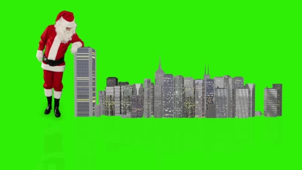 Babbo Natale magicamente costruendo una città moderna — Video Stock
