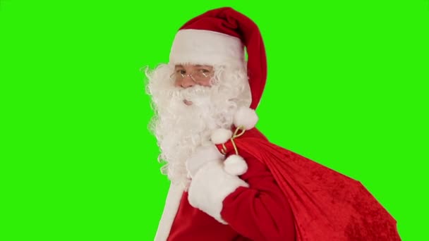 Санта-Клаус его сумка для переноски — стоковое видео