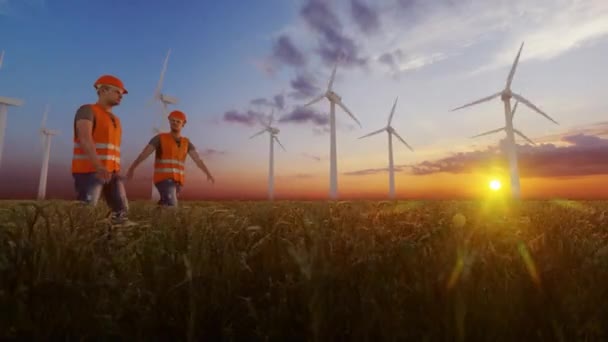 Maintenance Workers Wheat Field Wind Turbines Background Beautiful Sunrise — Video Stock
