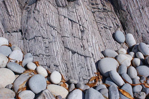 The combination of round and striped stones. — Stock Photo, Image