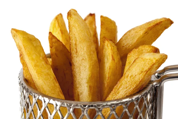 Franse frietjes in mand — Stockfoto