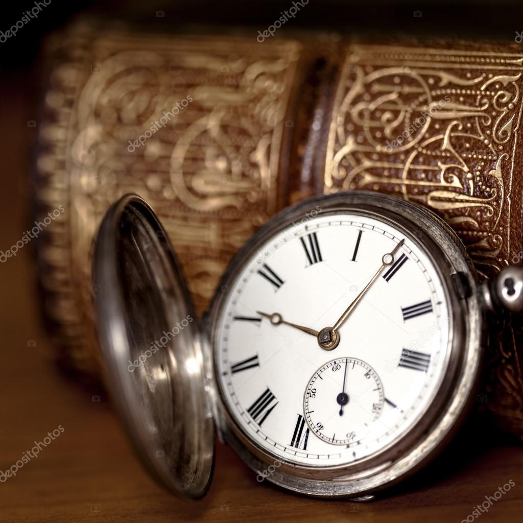 Pocket Watch with Old Book