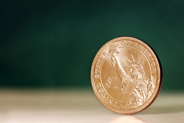 American One Dollar Coin over Green Background — Stock Photo, Image