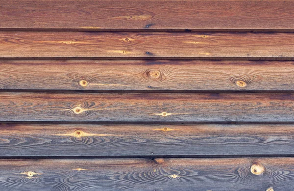 Drewniane tło.Tekstura naturalnych desek drewnianych, zaciemnione przez czas. — Zdjęcie stockowe