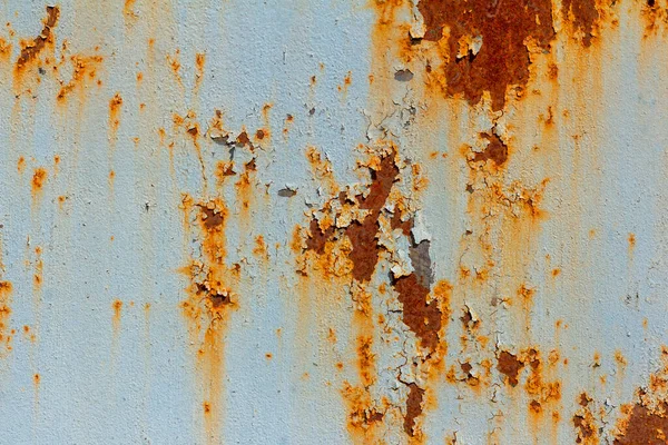 녹슬고 녹슨 푸른 금속 벽, 페인트가 떨어지고 녹슨 배경. — 스톡 사진