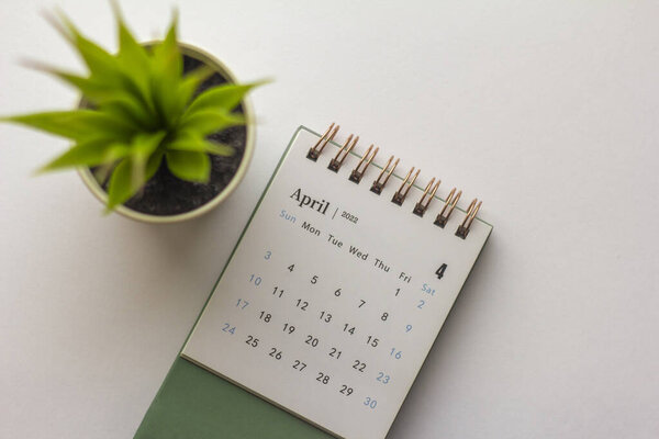 Desktop calendar for April 2022 on a light background