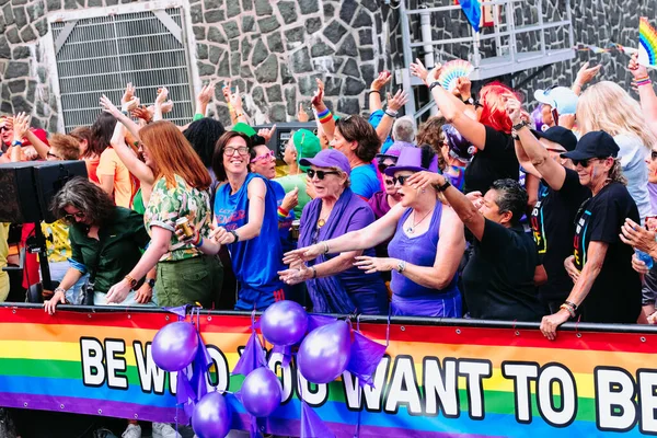 Pride Parade of lesbian, gay, bisexual, transgender, queer and allies. LGBTQ senior, young generations participate in Canal Pride Parade - Netherlands, Amsterdam, August 6, 2022