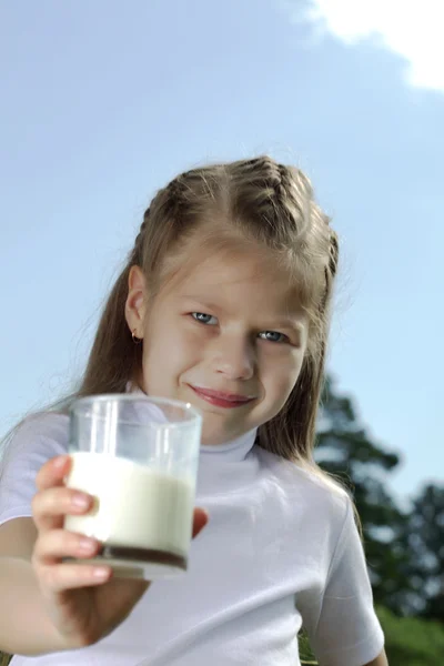 Girl with milk glass — Stock Photo, Image