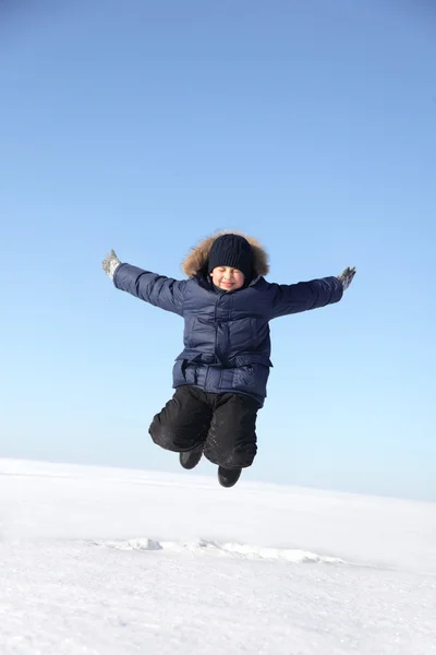 Boy jumping with his eyes closed — Stock Photo, Image