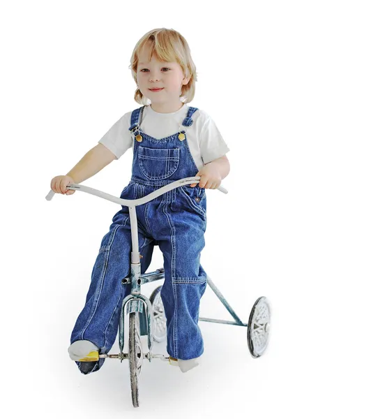 Ragazzo su triciclo vintage bici isolato su bianco — Foto Stock