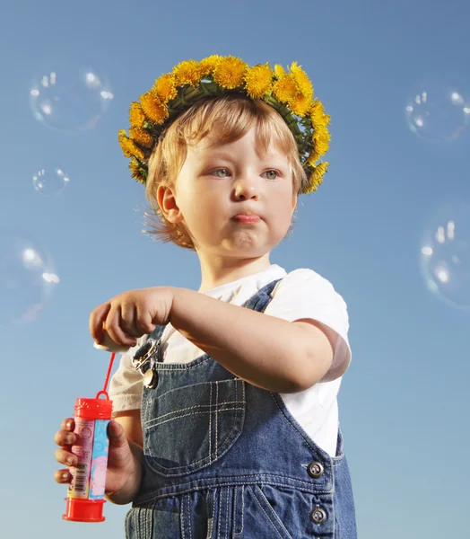Boy play in  bubbles — Stock Photo, Image