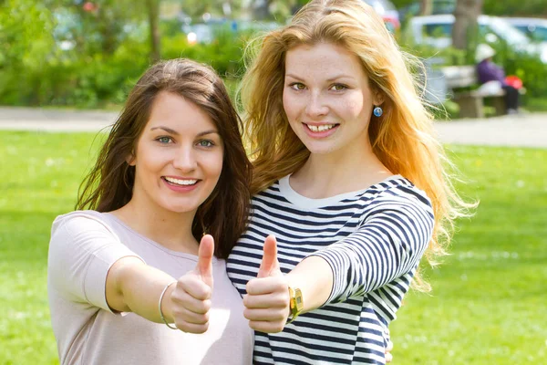 Two Young Woman Thumb — Stock Photo, Image