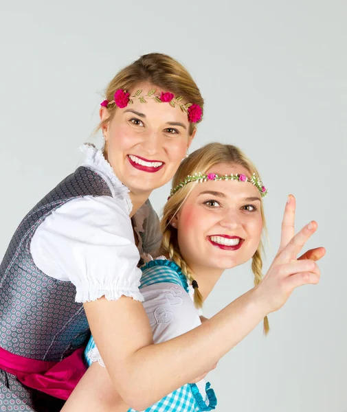 Two Happy Girls Colorful Dirndl Having Fun — Fotografia de Stock