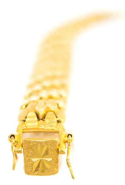 Guld armbånd - Stock-foto
