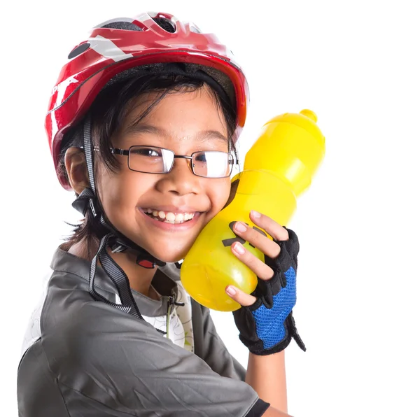 Liten flicka med cykling klädsel — Stockfoto