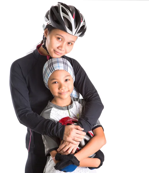 Anne ve kız kıyafetleri Bisiklete binme — Stok fotoğraf