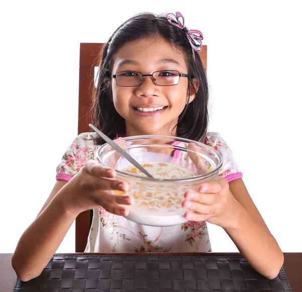 Young asian malay girl have a breakfast — Stock Photo, Image