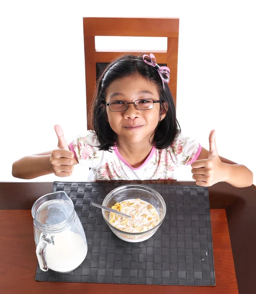 Young asian malay girl have a breakfast — Stock Photo, Image