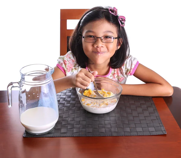 Junge asiatische malaiische Mädchen haben ein Frühstück — Stockfoto