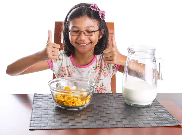 Young asian malay girl have a breakfast — Stock Photo, Image