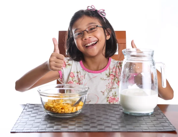 Young asian malay girl have a breakfast — Stock Photo, Image