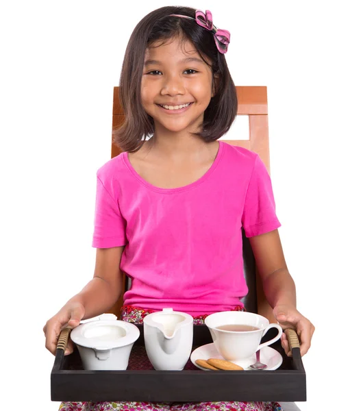 Little Asian girl drinking tea whit pleasure — Stock Photo, Image