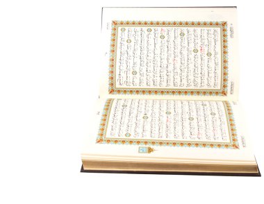 The holy Quran on a wooden book clipart