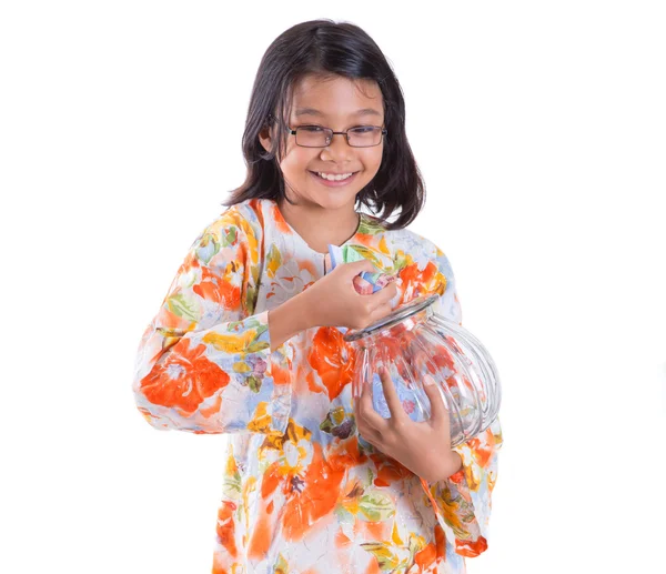 Giovane ragazza con i soldi vaso — Foto Stock