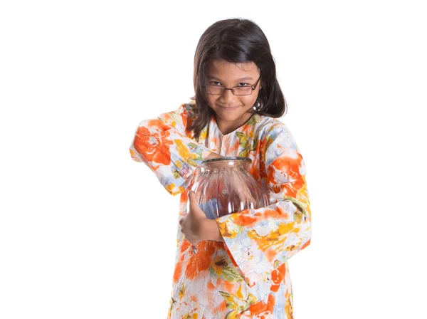 Jong meisje met geld pot — Stockfoto