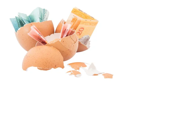 Banknotes inside  eggs — Stock Photo, Image
