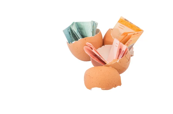 Banknotes inside  eggs — Stock Photo, Image