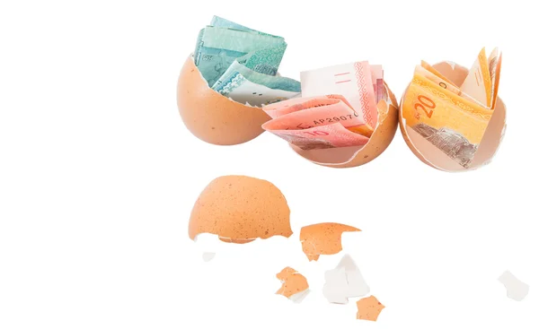Banknotes inside  eggs — Stock Photo, Image