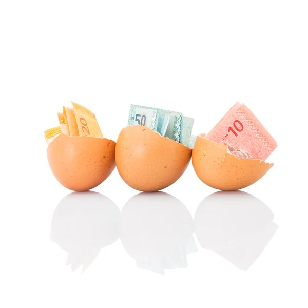 Banknotes inside  eggs — Stock Photo, Image