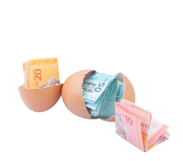 Banknotes inside  eggs